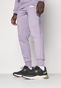 Puma LOGO - Pantaloni sportivi - pale plum