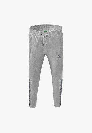 Lichtgrijze joggingbroek met een elastische tailleband, trekkoord voor aanpassing en zijstrepen met een zwart logo patroon.