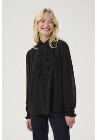 Črna bluzica z nabranim prednjim delom, dolgimi rokavi z nabranimi manšetami in visokim ovratnikom iz lahkega, prosojnega materiala.