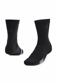 Calzini sportivi neri con design a costine, punta e tallone imbottiti e dettagli testurizzati. Supporto dell'arco rinforzato e forma elegante e aderente.