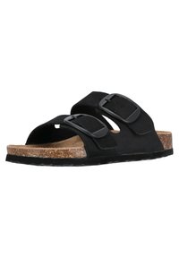 Svart dubbelsandal med spännen, korkfotbädd, gumm outsole och utskärningsdesign; slät konsistens och klassisk silhuett.
