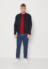 Tommy Jeans SCANTON - Vaqueros slim fit - denim medium