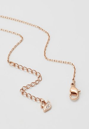 Rose gold chain necklace with a small swan-shaped charm adorned with three clear crystals and a lobster clasp closure.