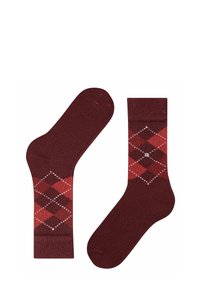 Calzini bordeaux con un motivo argyle in rosso scuro e bianco, realizzati in materiale morbido, con un bordo a costine e una texture liscia.