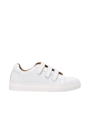 White sneaker with adjustable Velcro straps, leather upper, round toe, minimalistic design, and rubber outsole. Brown accents at the heel.