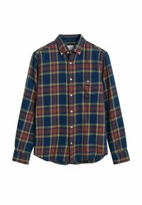 Geruiten overhemd in marineblauw, groen, geel en rood. Knopsluiting met kraag, lange mouwen en één enkele borstzak. Katoenen materiaal.