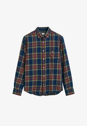 Karierte Hemd in Marineblau, Grün, Gelb und Rot. Knopfverschluss, mit Kragen, langen Ärmeln und einer einzelnen Brusttasche. Aus Baumwolle.