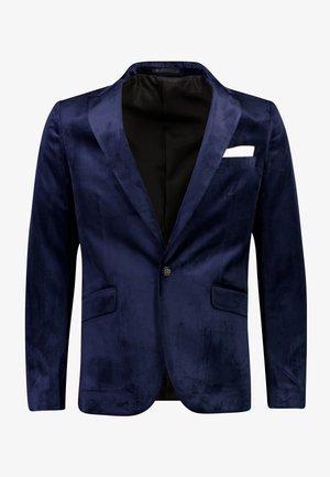 Blazer in velluto blu navy con chiusura a un bottone, revers a contrasto, tasche frontali e un fazzoletto bianco a contrasto. Fodera interna nera.