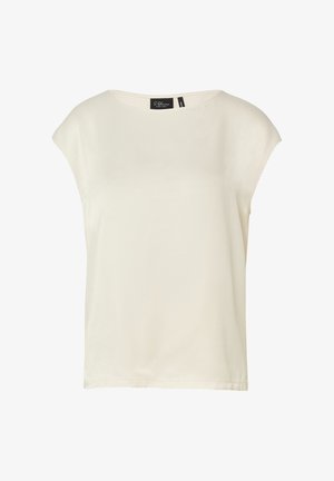 Cremefarbene ärmellose Bluse mit rundem Ausschnitt und einem kleinen schwarzen Markenetikett auf der Innenseite des Kragens.