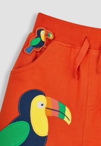 JoJo Maman Bébé APPLIQUE IN POCKET - REGULAR FIT - Teplákové kalhoty - orange toucan