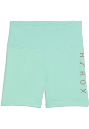 Lysegrønne atletikshorts med høj talje med et lodret Puma- og HEROX-logo trykt i beige på højre ben.
