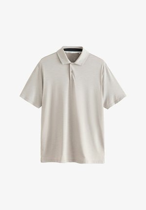 Gaiši bēša polo krekls no teksturēta auduma. Ir apkakle, trīs pogu apakšējā daļa un īsas piedurknes. Vienkāršs un klasiskas dizains.