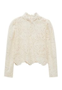 Blouse en dentelle blanche avec des manches longues, un col montant et un ourlet en forma de vagues. Présente des motifs paisley complexes et une texture transparente.