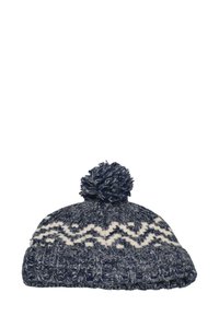 Knitted beanie hat in navy blue with a white zigzag pattern. Features a fluffy pom-pom on top and a ribbed texture at the hem.
