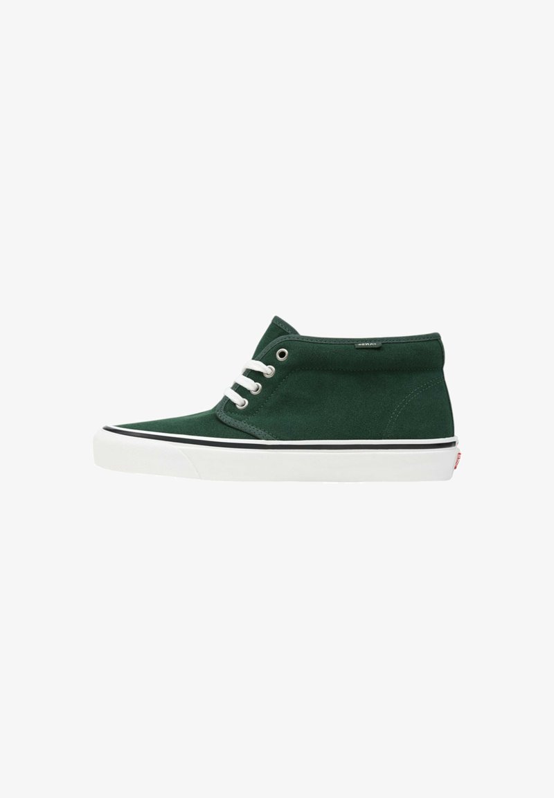 Green canvas high-top sneaker with white rubber sole and laces, featuring black accents along the sole edge and a smooth texture.