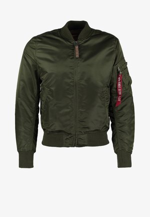 Olive green bomber jacket, made of shiny fabric, featuring a front zipper, ribbed cuffs, and a side pocket with a red tag.
