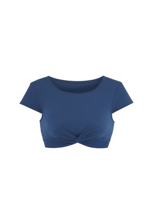 Blue short-sleeve crop top with a twist knot detail at the front, made from a smooth fabric with a fitted design and round neckline.