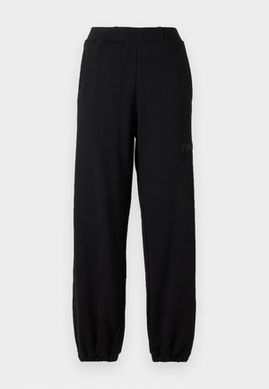 Black sweatpants made of cotton blend, featuring an elastic waistband and cuffed ankles. Subtle logo detail on the side.