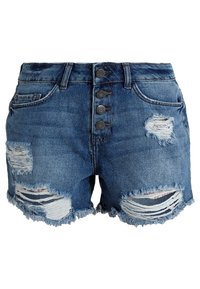 Modré deninové kraťasy s třásněmi, zapínání na knoflíky a několik děravých záplat na předních stehnech a kapsách.