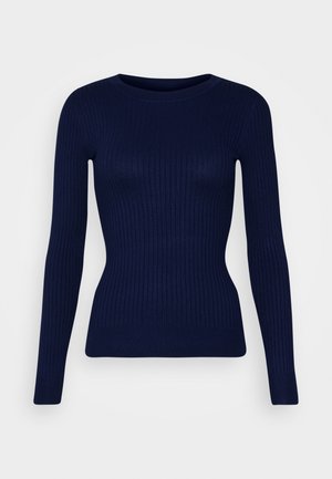 Tummansininen ribbiknitti villapaita, jossa on pitkät hihat, pyöreä pääntie ja kapea siluetti. Paidan pinnassa on sileä rakenne ja hienovarainen kiilto.
