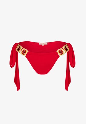 Red bikini bottom featuring a wide waistband with three large red gemstones and golden accents, secured with ties on both sides.
