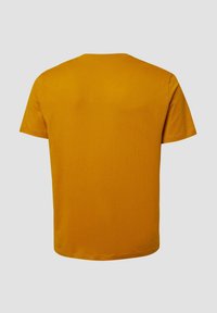 Short-sleeve t-shirt in mustard yellow, crafted from soft cotton with a crew neck. Features a plain design without logos or patterns.