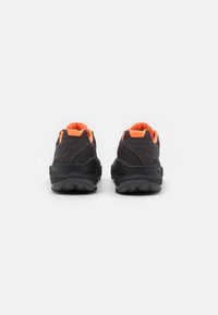 Black athletic shoes with orange accents, featuring a textured upper, a cushioned collar, and a rugged, multi-directional outsole for traction.