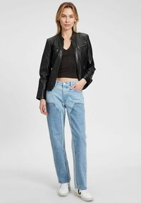 Mauritius MWJANKA - Lederjacke - black