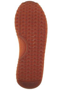 Rubber shoe sole, brownish-orange color, textured with wavy patterns, marked with size "37" and "New Haven, Connecticut" inscription.