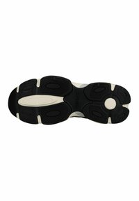 Semelle de basket noire et blanche avec motifs de grip texturés et nom de marque Replay embossé au centre.