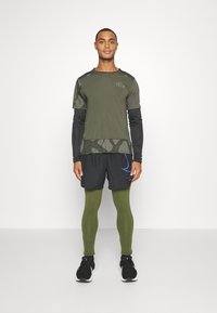 Nike Performance REPEL CHALLENGER - Calças de fato de treino - rough green/silver