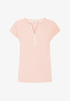 Gaiši rozā īsām piedurknēm tunika ar V-veida kaklu, priekšējo kabatu un teksturētu pogu rindu. Izgatavota no mīkstas, elpojošas auduma.