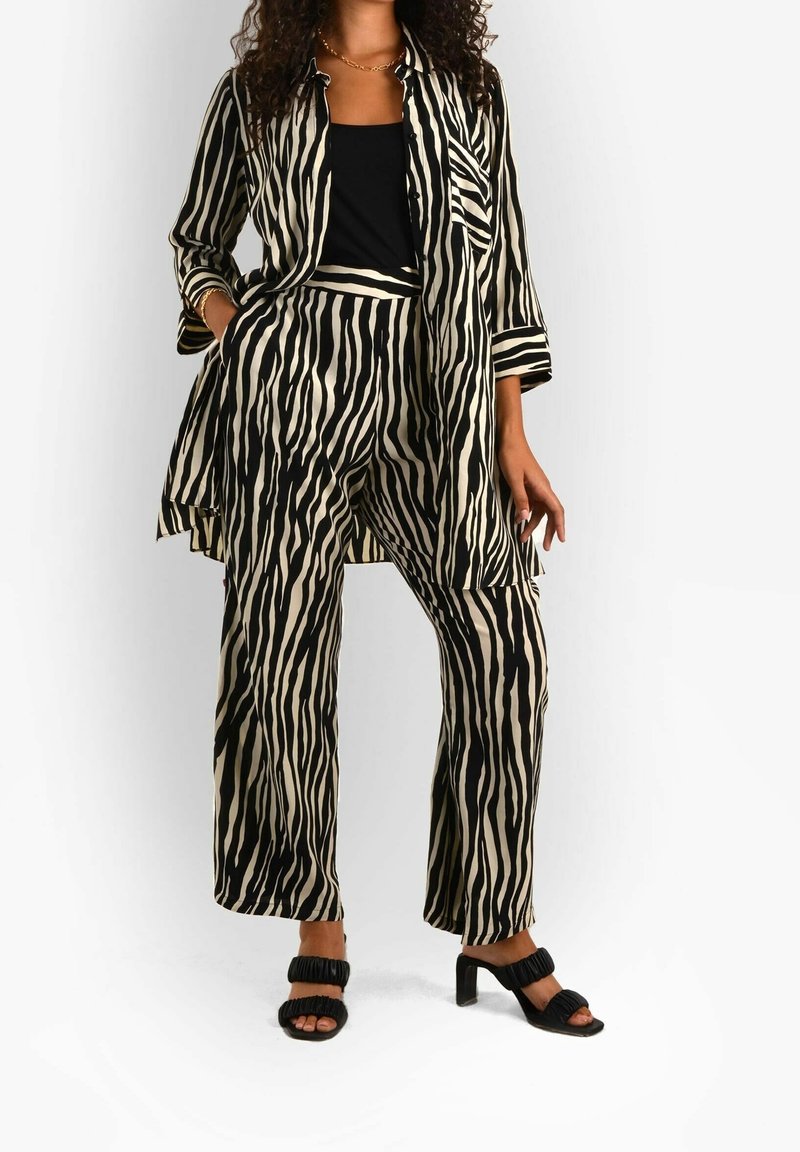 Live Unlimited London Housut - black