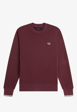 Felpa bordeaux con scollo rotondo, polsini e orlo a coste, piccolo logo bianco di alloro sul petto a sinistra e sottile striscia bianca sui polsini.