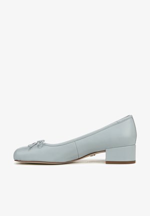 Light blue leather ballet flat with a rounded toe, small bow detail on the front, and a low, squared block heel. Smooth texture and clean lines.