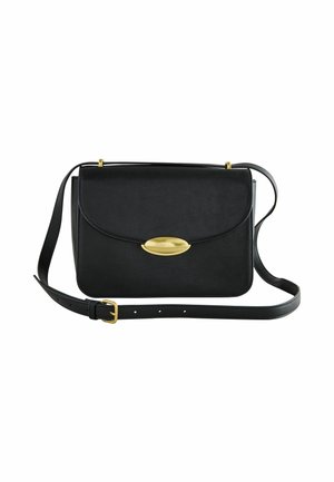 Black handbag with a gold oval clasp, featuring a shoulder strap and textured surface, positioned on a white background.