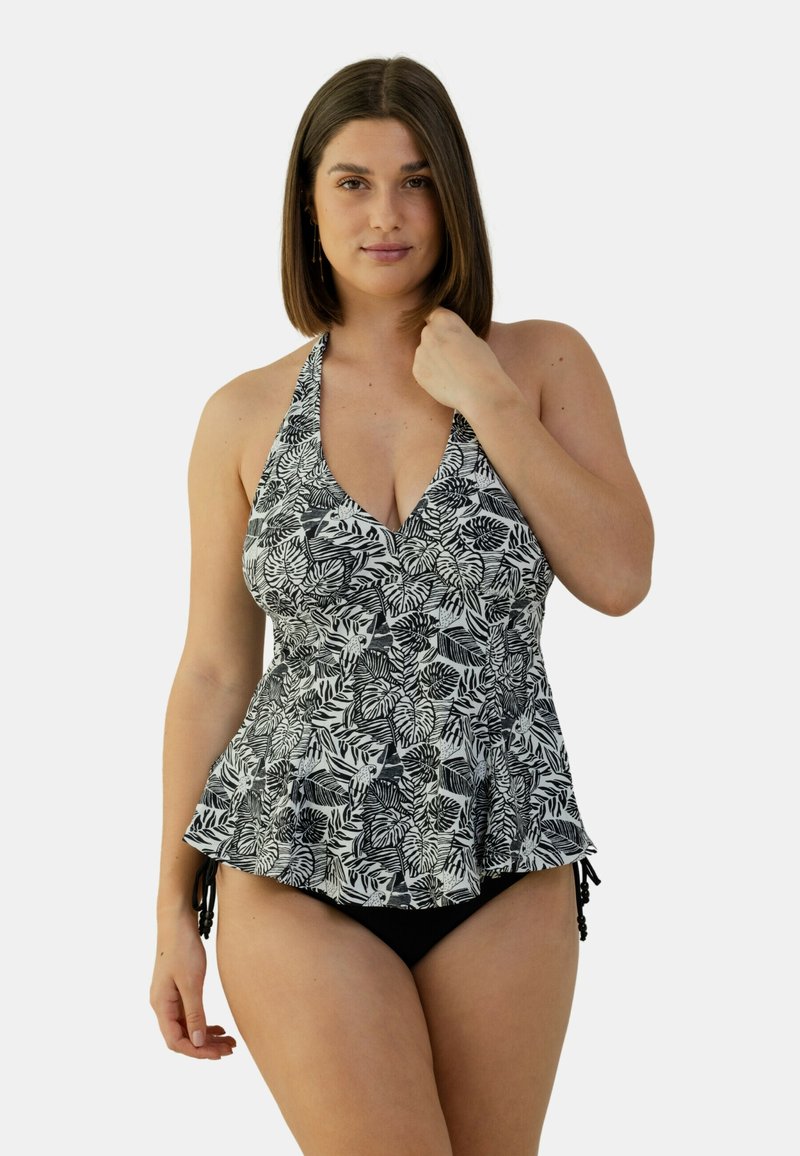 Haut de tankini à imprimé floral noir et blanc avec encolure halter et ourlet en peplum. À associer avec un bas de maillot de bain noir. Tissu lisse, liens réglables.