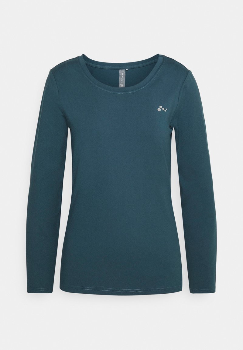 Langärmliges T-Shirt in Türkis mit runde Ausschnitt und einem kleinen reflektierenden Punktmuster-Logo auf der oberen linken Brust.