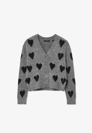 Cardigan grigio realizzato in morbido misto lana, con motivi a cuore neri, scollatura a V e chiusura con bottoni sul davanti. Design cropped.