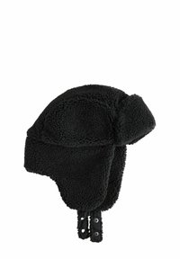 Black faux shearling trapper hat with ear flaps, showing a textured, fluffy surface and buttoned straps for secure fastening.