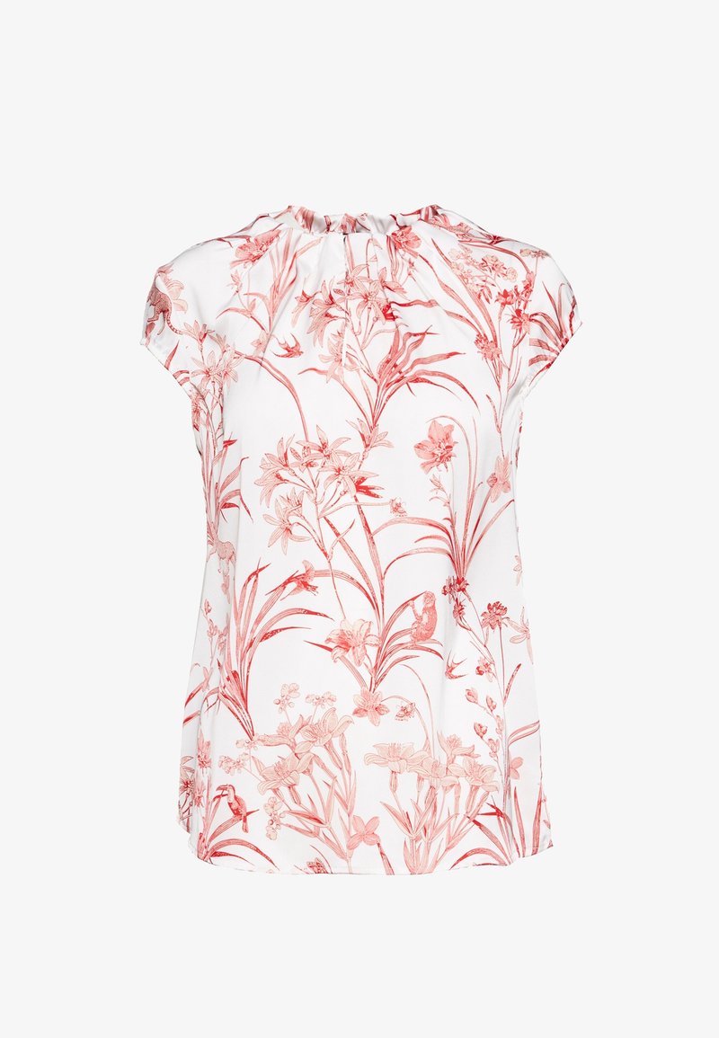 Blouse blanche à manches courtes avec imprimé botanique et animalier rouge comprenant des fleurs, des oiseaux et du feuillage, avec un col froncé.