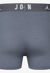 Grau melierte Boxershorts mit einer weichen Textur, einem figurbetonten Design und einem kontrastierenden Bund mit weißer Beschriftung und Logo.