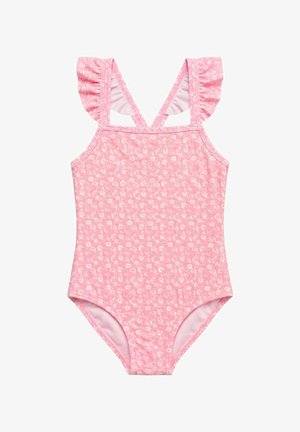 Traje de baño rosa para niño pequeño con patrón floral blanco, tirantes con volantes y diseño en forma de V en la espalda.