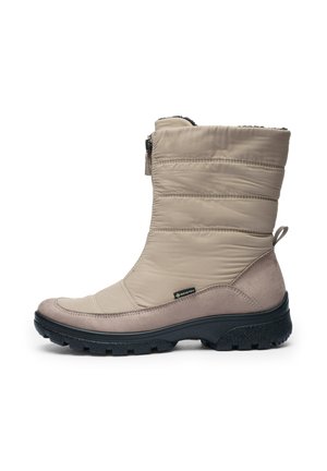 Beige insulated winter boot with black textured rubber sole, side zipper, Gore-Tex label, and pull tab at back for easy wear.