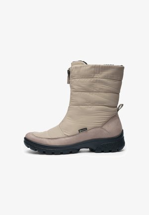 Beige insulated winter boot with black textured rubber sole, side zipper, Gore-Tex label, and pull tab at back for easy wear.