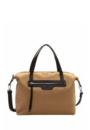 Tan suede håndtaske med sorte læderhåndtag, frontlomme med lynlås og aftagelig sort læder skulderrem, vist på hvid baggrund.