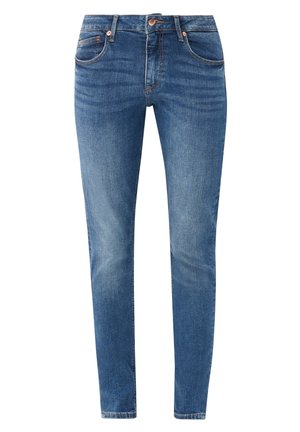 Dünne blaue Jeans aus Denim mit einem verblassten Finish, fünf Taschen und einem Knopfverschluss. Deutliche Nahtdetails entlang der Nähte.