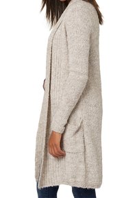 Light beige knit cardigan with long sleeves, open front, and two side pockets. Features a textured pattern and falls below the hips.