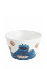 Ciotola in ceramica con un design conico, dotata di un personaggio blu peloso e decorazioni a forma di biscotti. Interno liscio bianco e base blu.