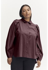 Burgundy button-up shirt with a collar, puffed long sleeves, and elastic cuffs. Made from smooth, lightweight fabric with a structured fit.